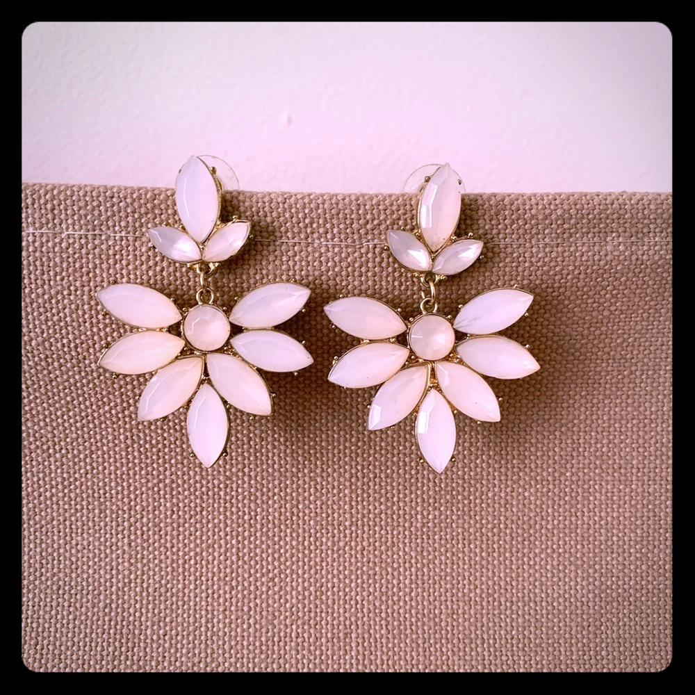 Light pink earrings with gold-colored backing